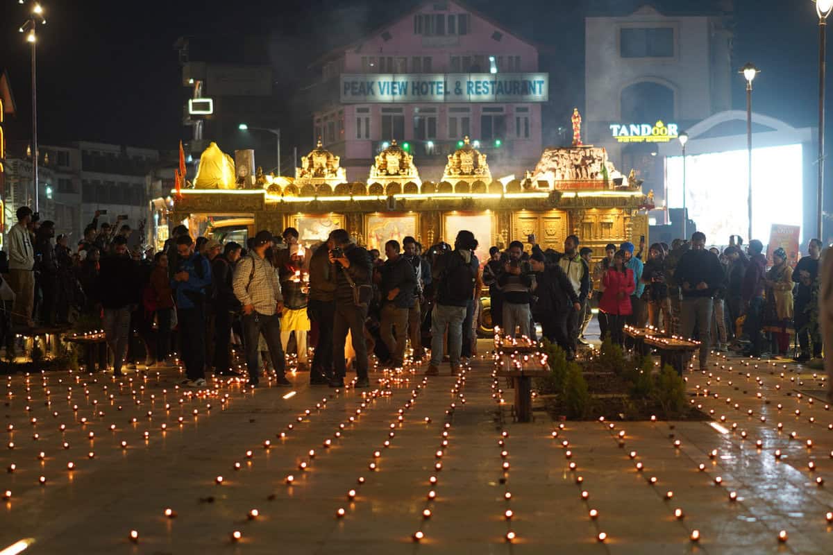 People decorate the premises of the temple with lights (Photo: Muzamil Bhat/Siasat.com)