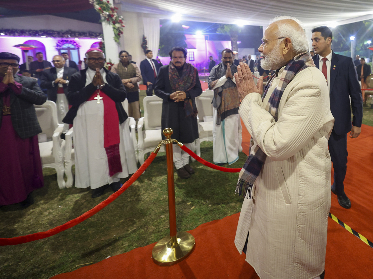 Prime Minister Narendra Modi during the Christmas celebrations at the residence of Union Minister George Kurian, in New Delhi.